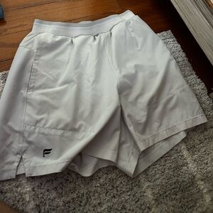 White lined fabletics men’s shorts